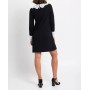 Short black knit dress with long sleeves