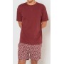 Ensemble pyjama court en coton. T-shirt à manches courtes et col rond. Short à taille élastiquée.