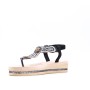 Flat sandal in faux leather for women